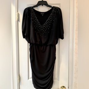 Sexy black dress with gold, silver beads. Worn once! Comfortable and gorgeous!
